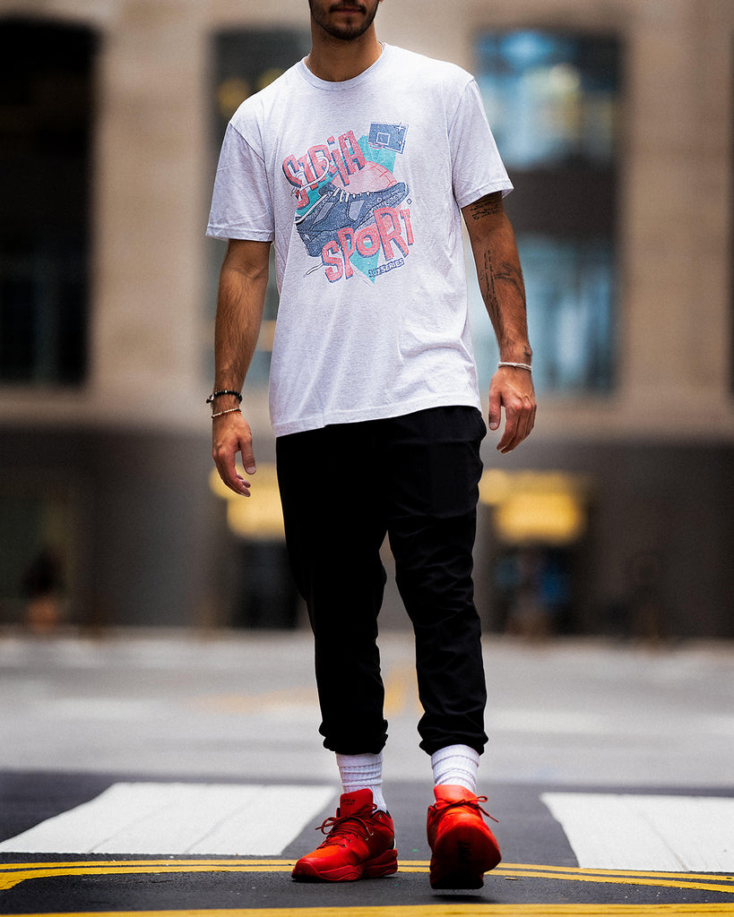 Stria Sport Vintage T-shirt with shoe, guy walking in the city